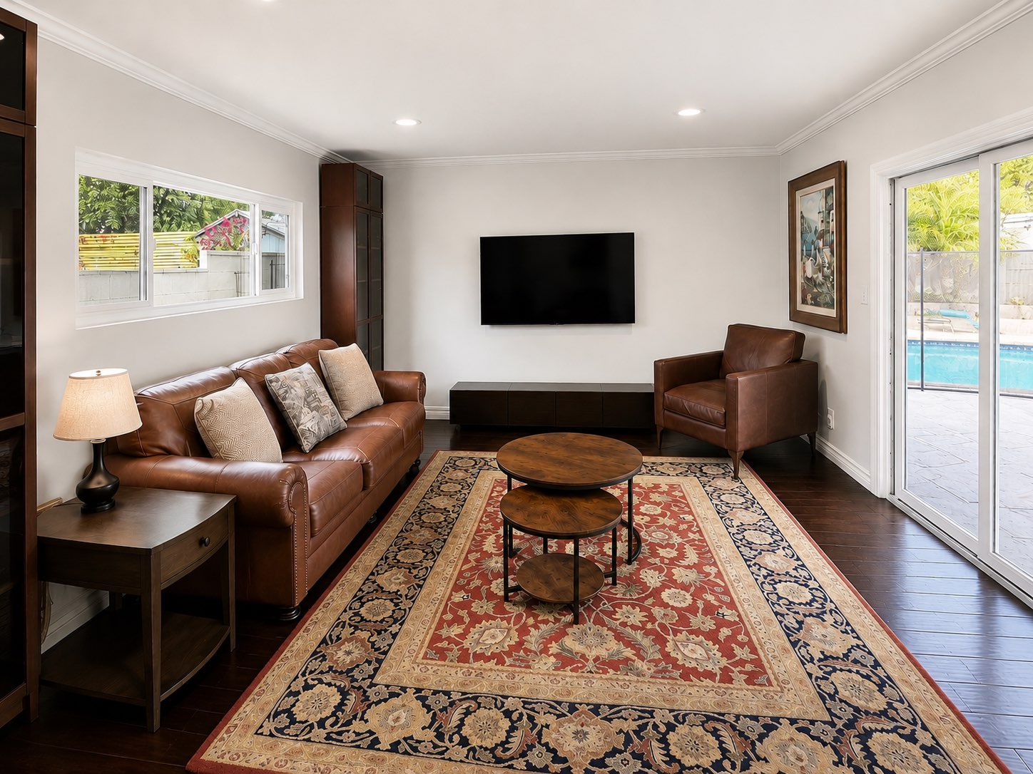 Comfortable lounge area with leather seating and natural light
